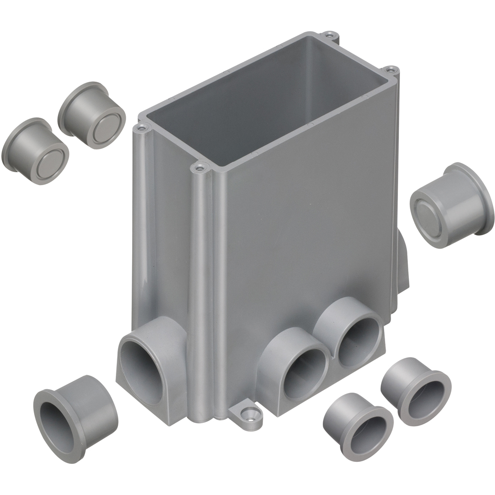 Concrete box with plugs and mud cover. Four 3-1/4 plugs, two 1" plugs.
