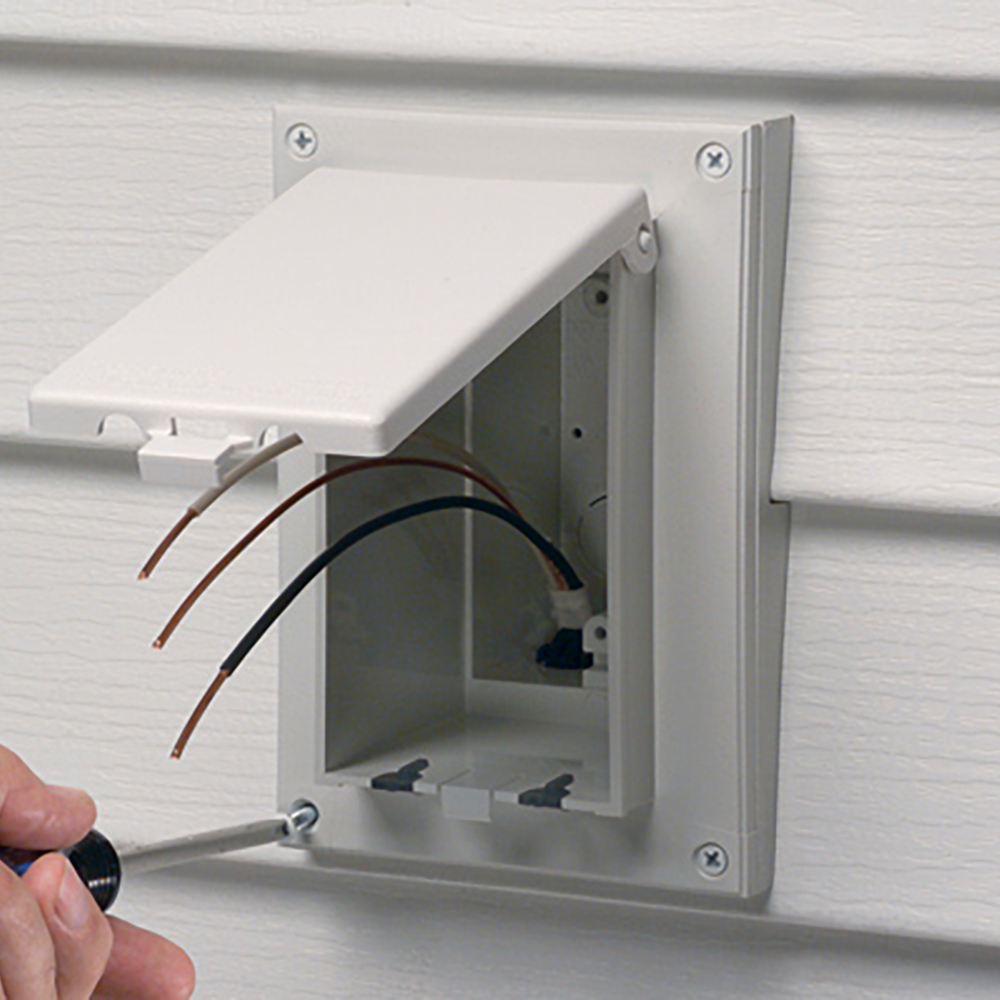 Arlington's Low Profile In Box is excellent for retrofit siding construction. The single gang box replaces an electrical box, siding block, and bubble cover assembly with one unit. Mounts vertically to siding with a lap size of 1/2" and has a white cover.