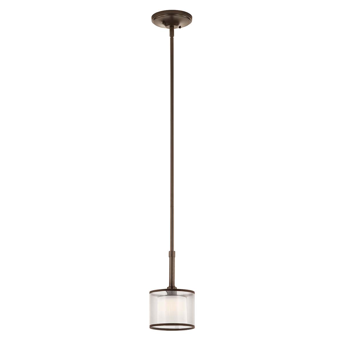 The Lacey(TM) 10.25in; 1 light mini pendant features a classic look with its Venetian detail of curves in Mission Bronze finish and satin etched cased opal inner diffusers and light umber translucent organza outer shade. The Lacey mini pendant is perfect in several aesthetic environments, including transitional and traditional.