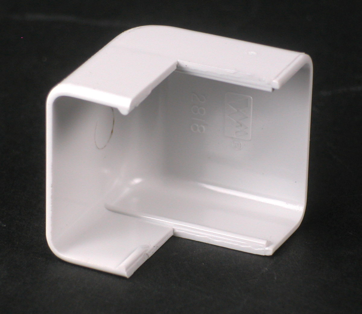Single-Channel Non Metallic External Elbow Fitting; 1-1/8 Inch Length x 1 Inch Width Ivory, PVC
