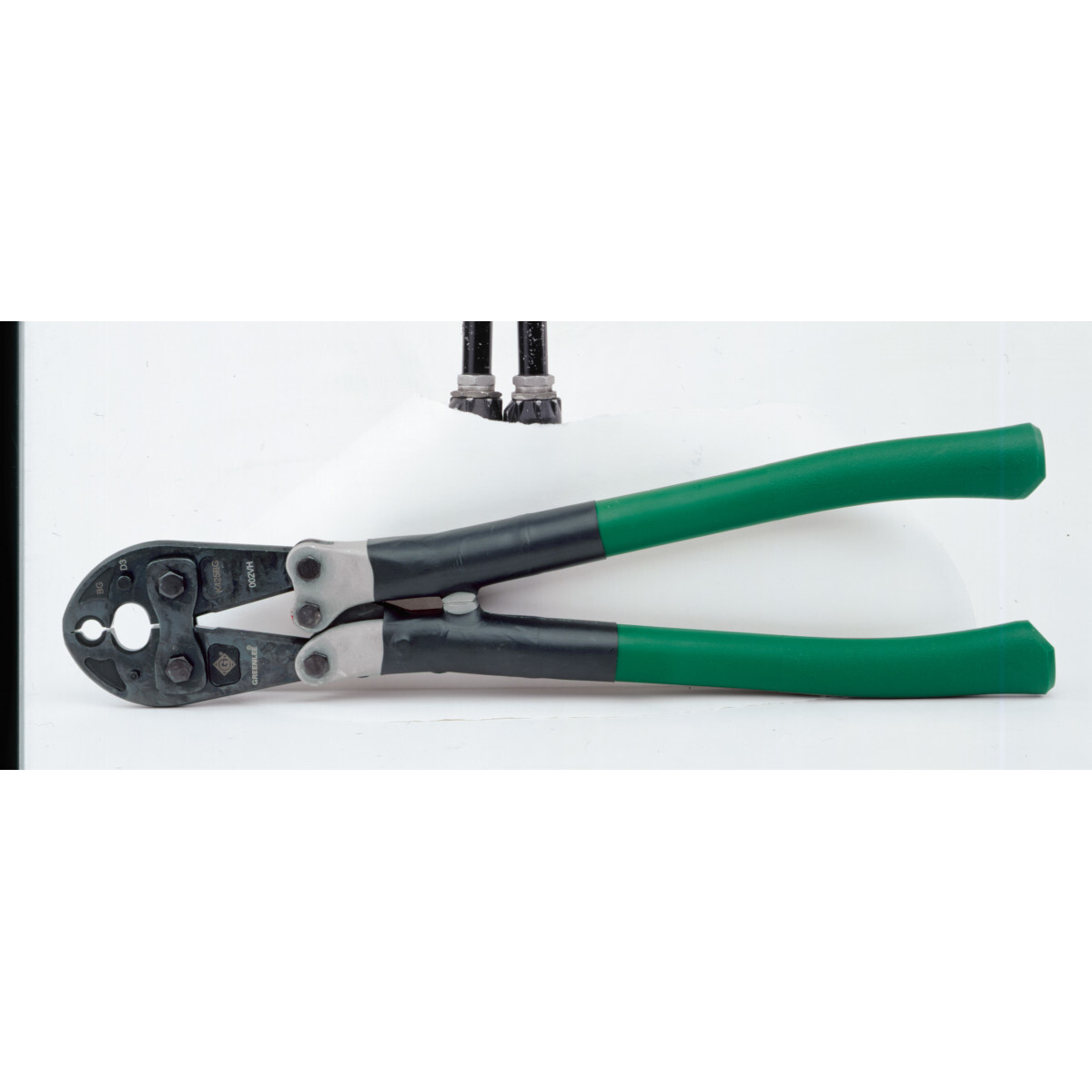 Manual Crimping Tool with D and BG Die Grooves.  Designed for crimping a wide range of overhead service entrance connections, overhead splices, and overhead taps.  Easy-to-use MD-6 type "pop" tool.  K425 tools are equipped with D, die groove and either "BG" or "O" die groove.  The D die groove serves as a die seat for all Greenlee KD6 and industry "W" type dies.  Bent fiberglass handles provide a solid grip, good leverage and better durability than wood.  Low friction-impregnated bushings at pivot joints provide smooth operation and long life.  Complete crimps are assured with an over-center cam mechanism.  Tool can easily be checked visually for proper adjustment and can be adjusted with Allen wrenches.