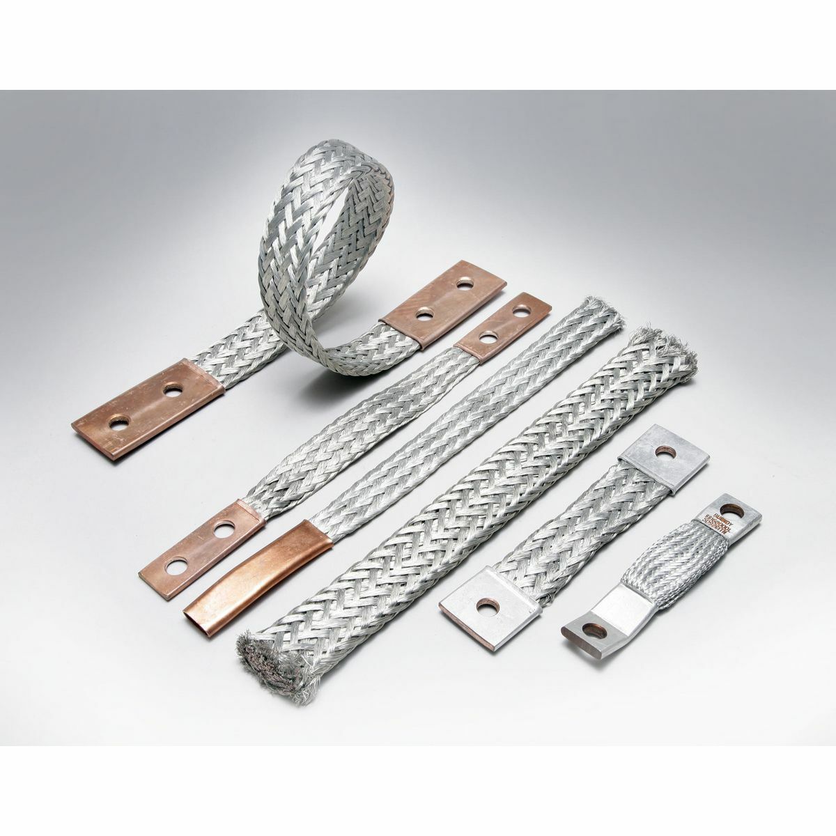 Copper Braid, 12" Long, 2 Holes 2 Ferrules, 7/16" Stud, 1-1/4" Stud Hole Spacing, 190 Amps Indoor, 225 Amps Outdoor.